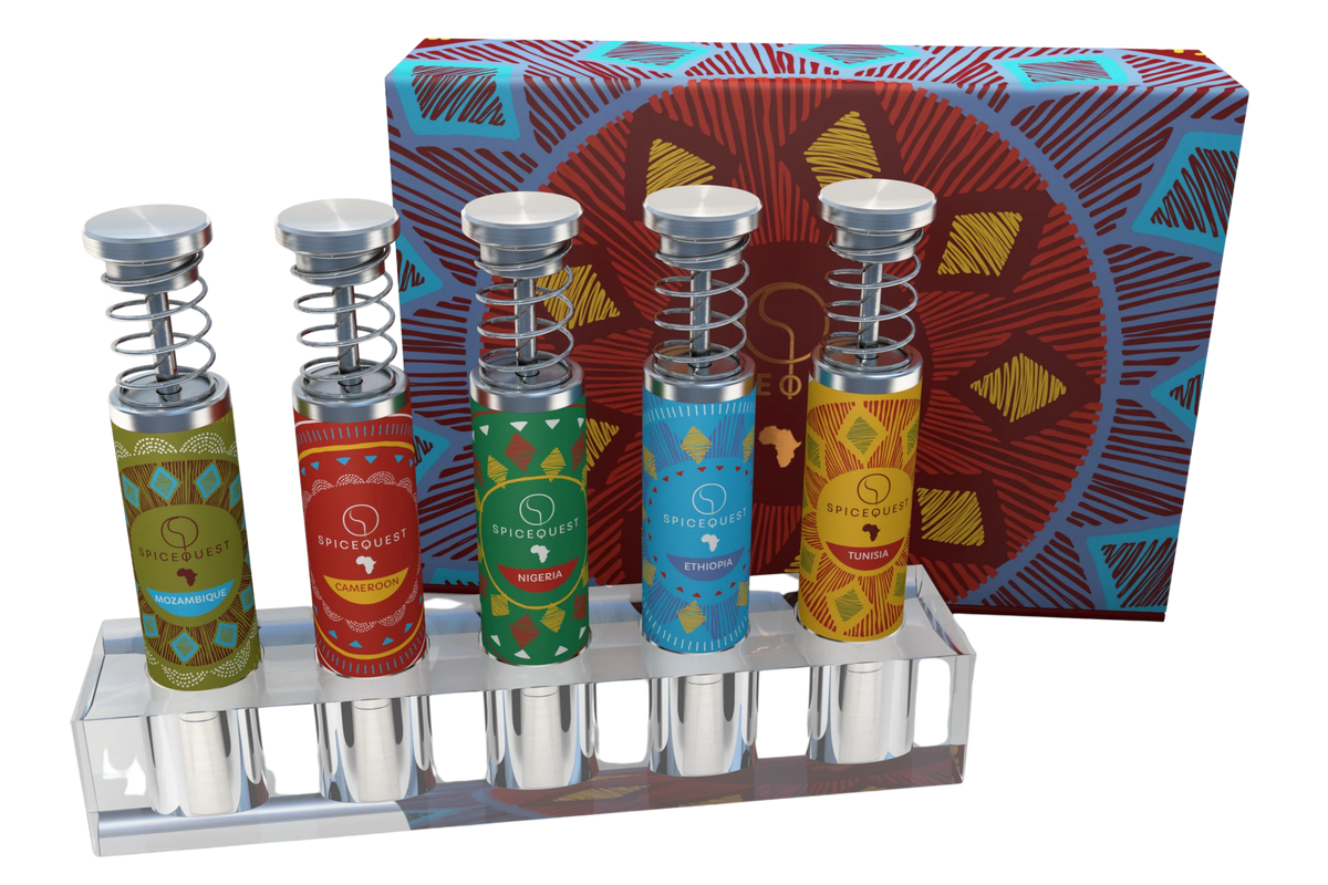 SpiceQuest African Spice Kit with five colorful grinders, acrylic stand and presentation box